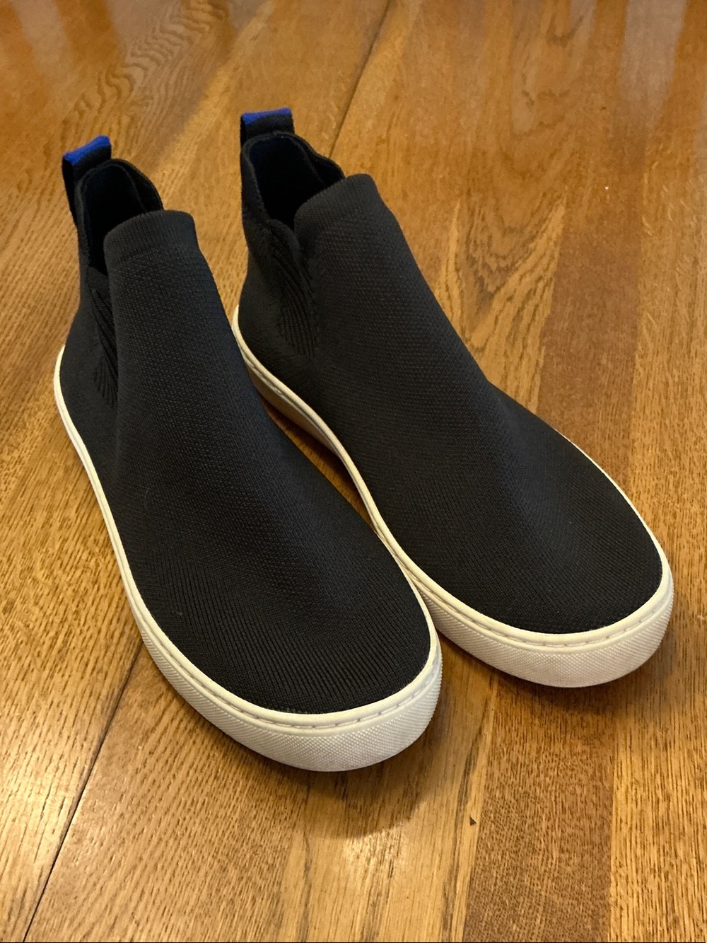 Woman’s Rothy’s black pull on sneakers. Size 9. Gently worn. Preowned. Cute!